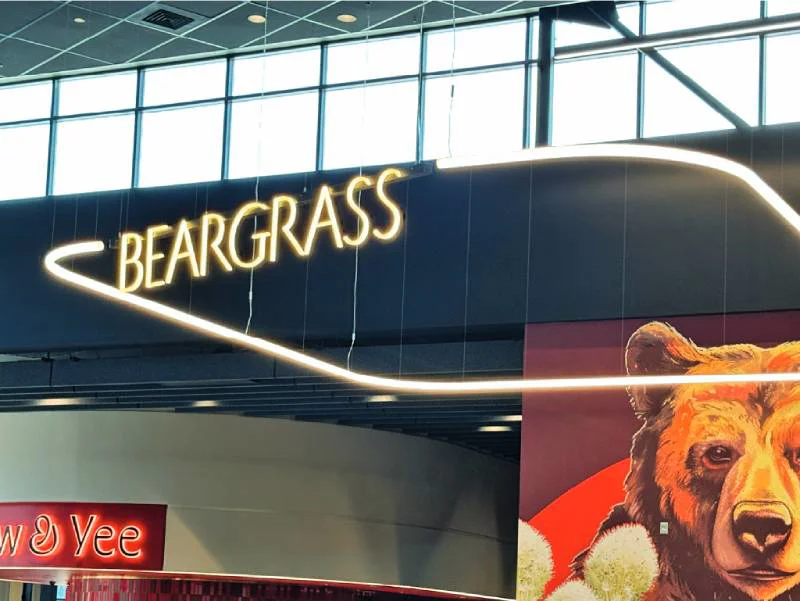 An imag eof the lit up BEARGRASS interior signage.